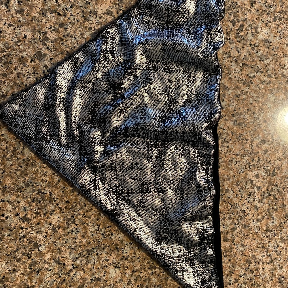 New Silver/Black Mask. Reversible. Never used